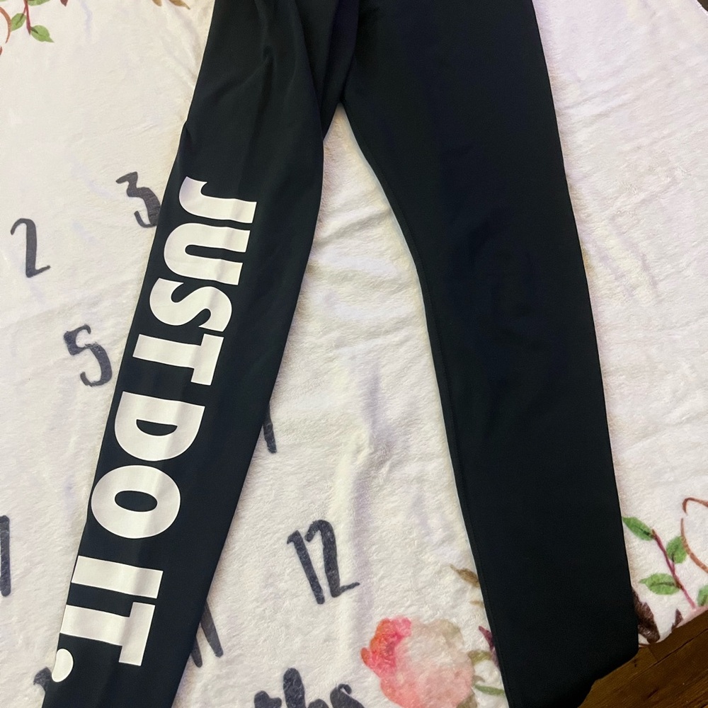 Nike women Black Leggings with Bold Slogan.